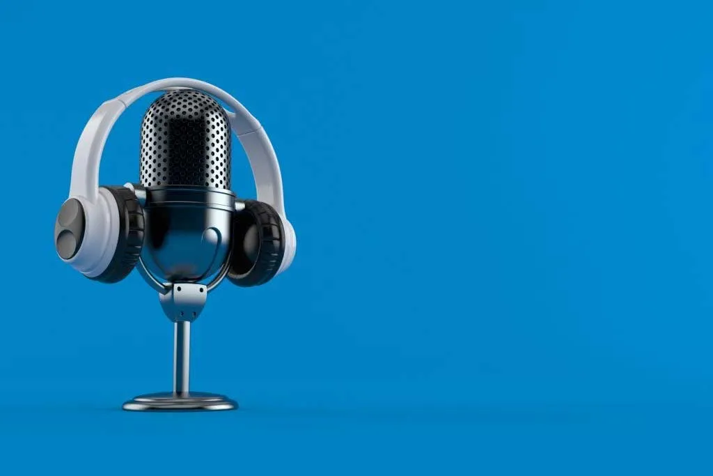 interview concept with headphones on blue background
