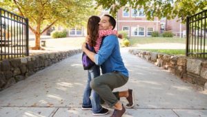 father dropping off daughter in front of school PJHMFP4 1