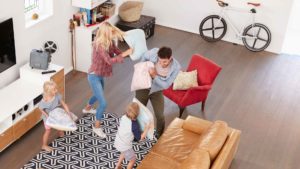 overhead shot of parents playing with children in P8SRCAJ 1