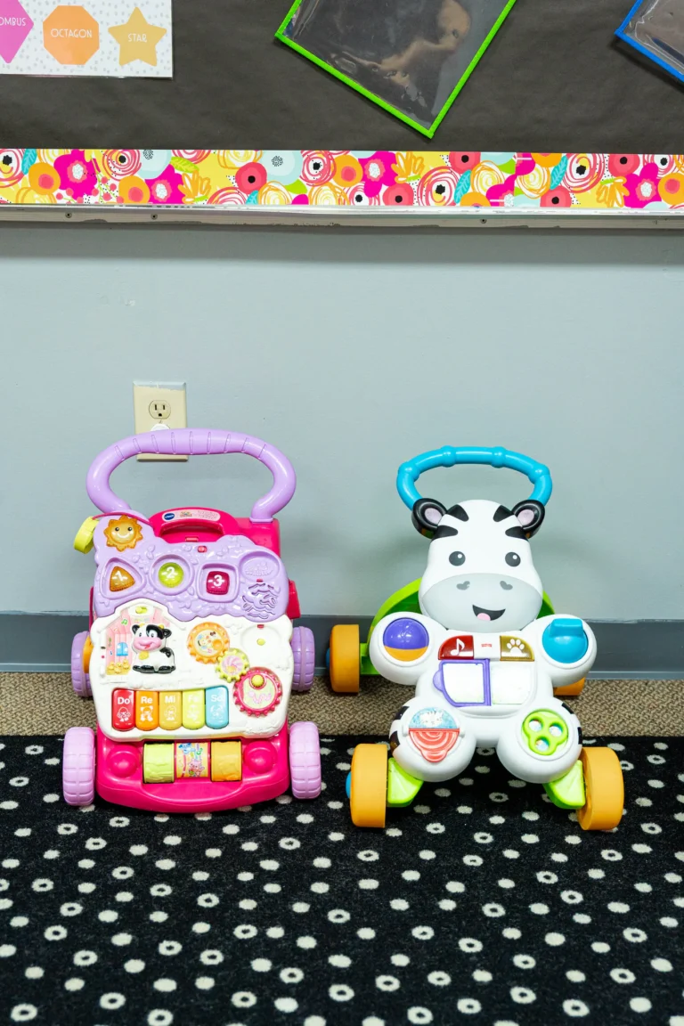 Push walker toys in a toddler classroom