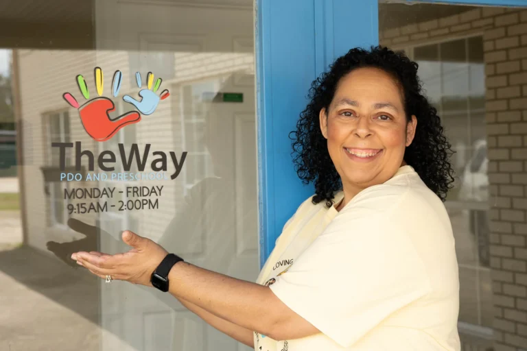 Director welcoming families at the front door of The Way PDO and Preschool