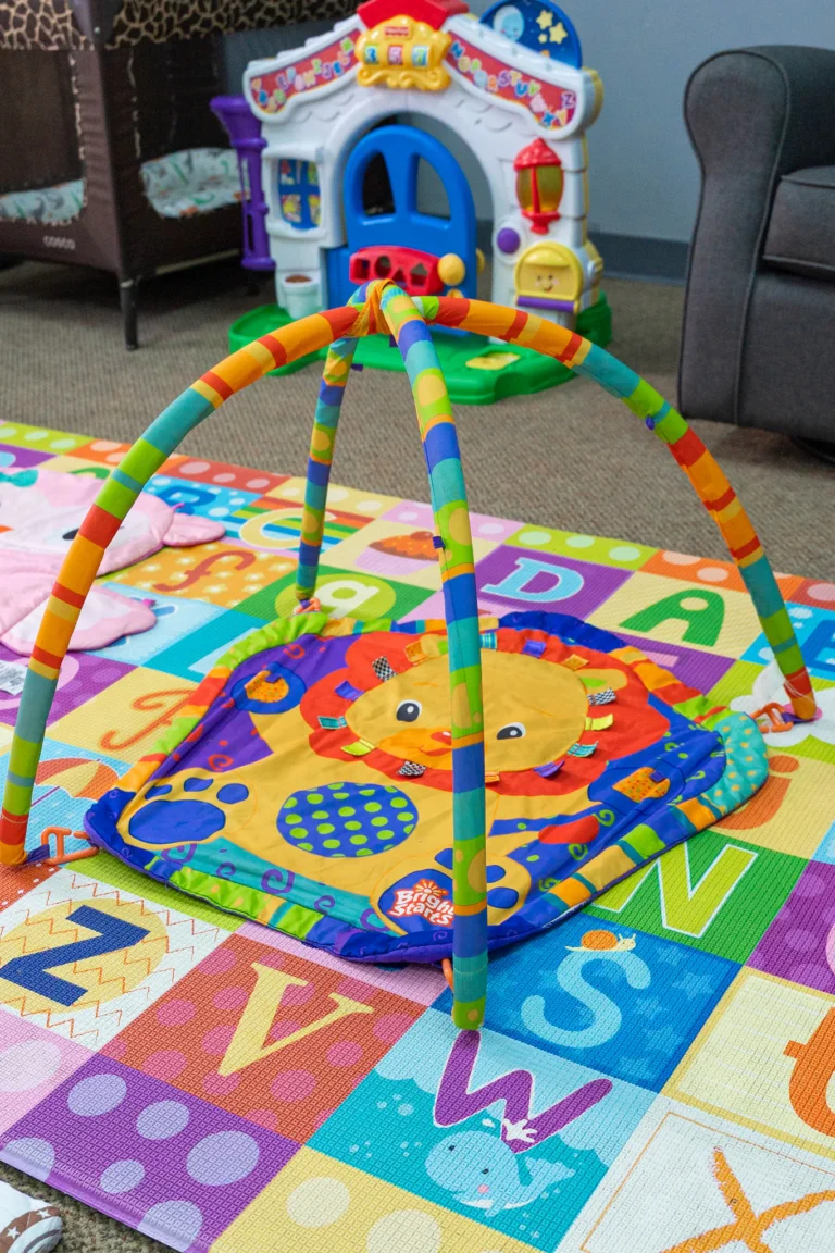 Baby play gym and mat in the infant room
