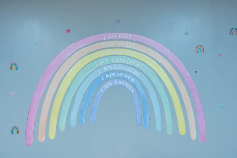 Rainbow wall mural in the infant room