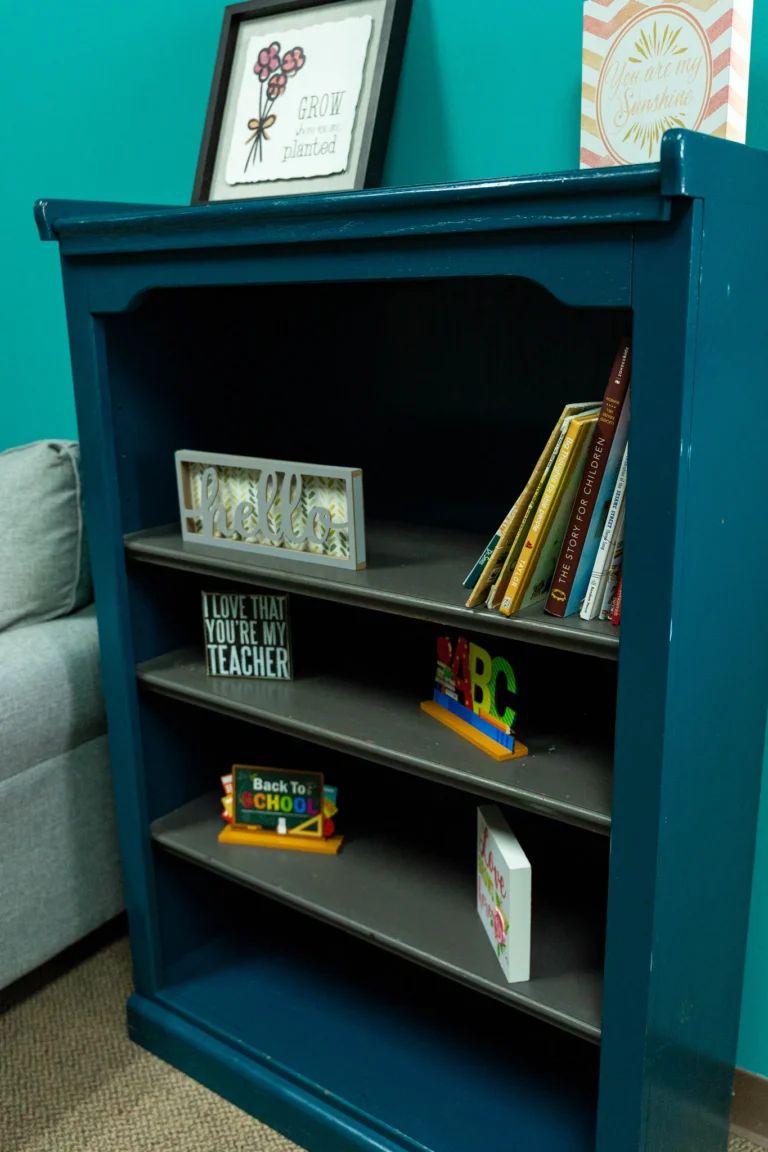 Cozy reading corner with bookshelf and armchair