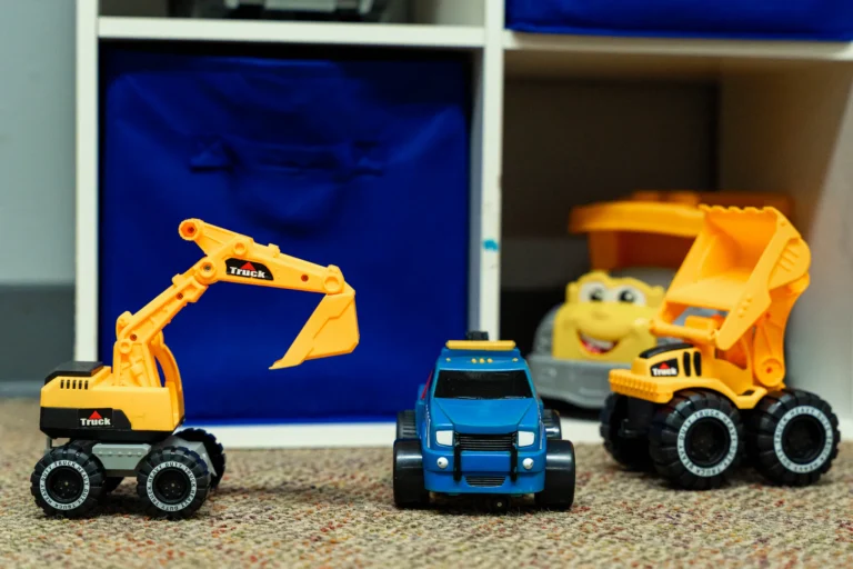 Toy construction trucks in a toddler classroom